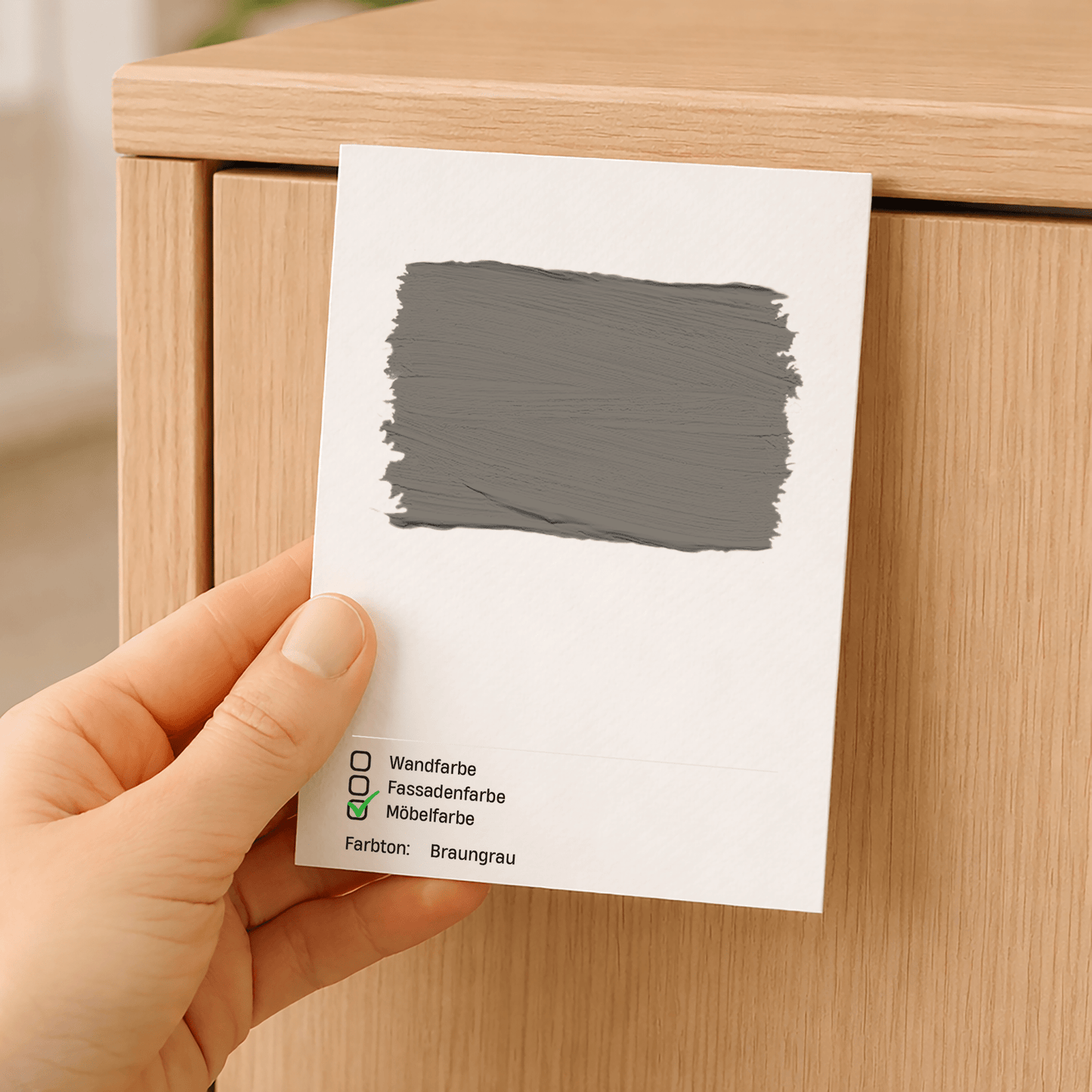 Farbmusterkarte A6 – mit echter Möbelfarbe handgestrichen auf Leinenstrukturkarton in Braungrau – Produktbild von Derendo